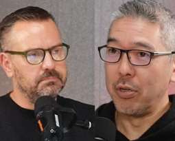 Kevin and Matt sitting in a room facing eachother.