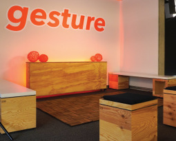 Room with "gesture" printed on the wall.